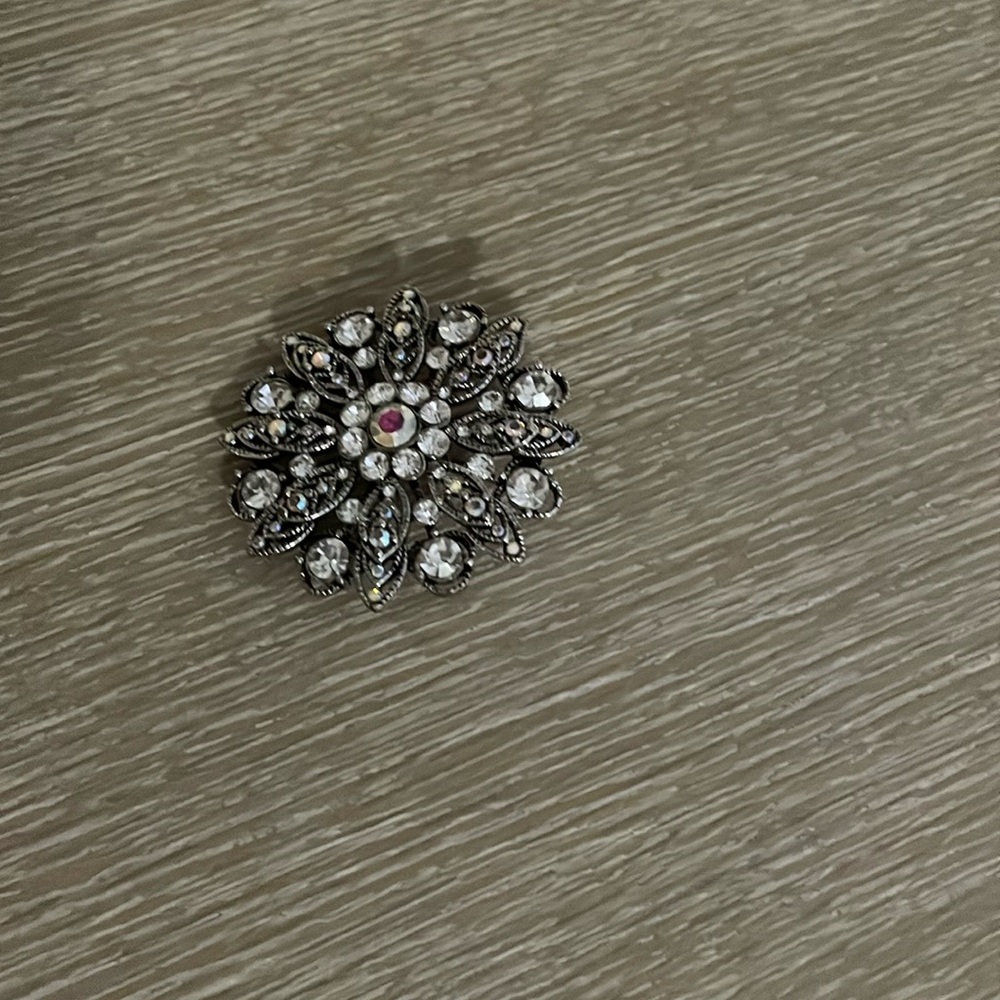 Beautiful and elegant silver and crystal snowflake brooch